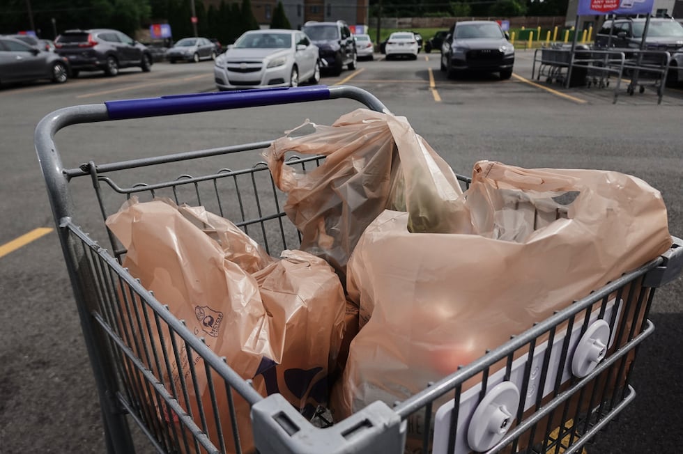 Plastic bags with groceries sit in a cart Monday, May 18, 2026, in Cincinnati.