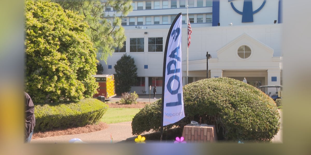 Lopa Flag St. Francis Medical Center and LOPA holds Wall of Heroes and Flag ...