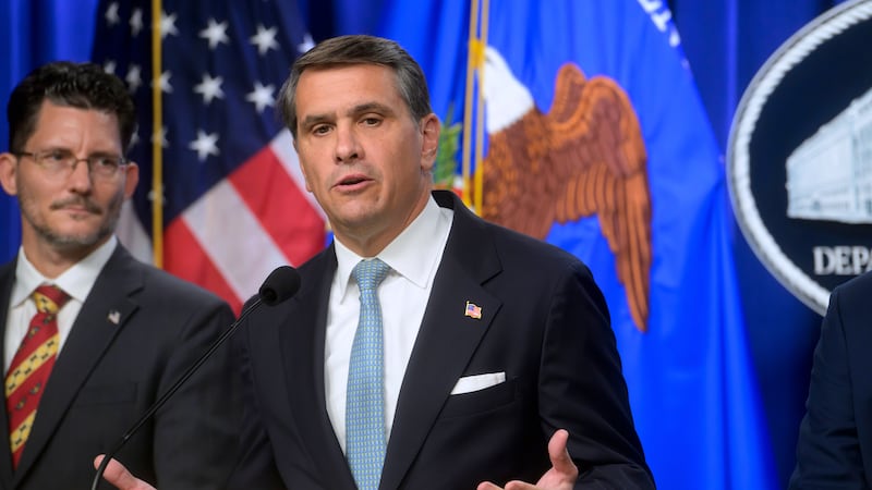 FILE - Acting Attorney General Todd Blanche, right, is joined by Deputy Assistant Secretary of...