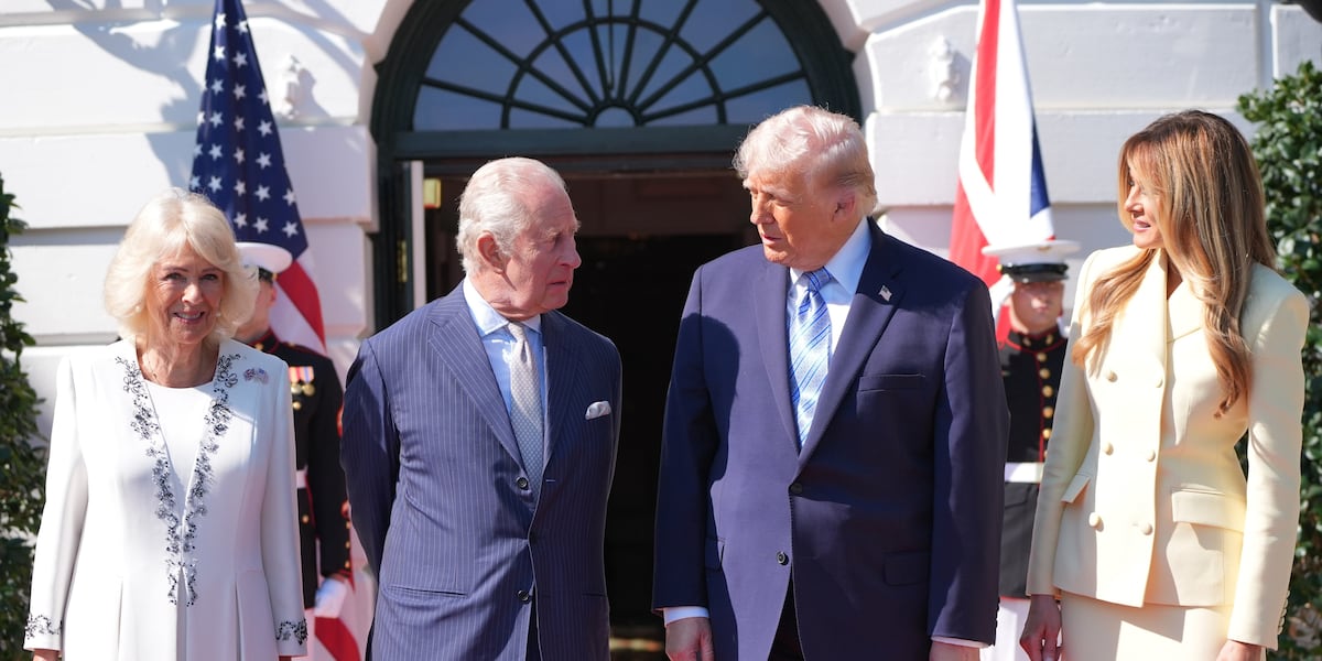 President and first lady participate in a greeting with King Charles III