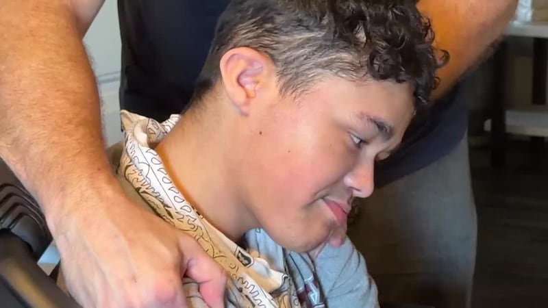 A mother is fighting for her son, who has special needs, to be allowed to walk across the...